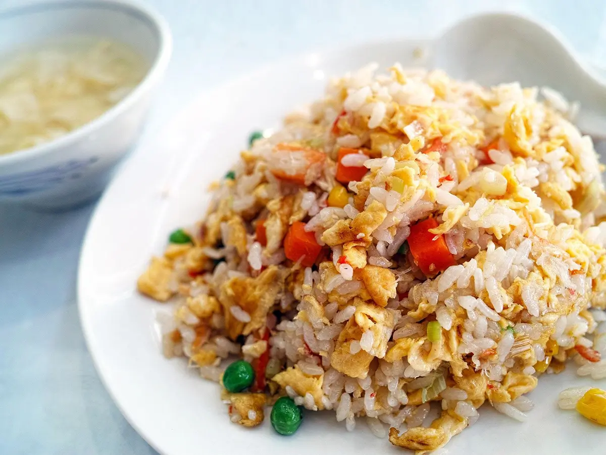 Cheng's-Asian-Cuisine-Asian-Restaurant-Fried-Rice-Winchester The grains of rice are distinct, mixed with golden scrambled eggs, tender peas, and sweet carrot dices at Cheng's Asian Cuisineļ¼a Asian Restaurant in Winchester